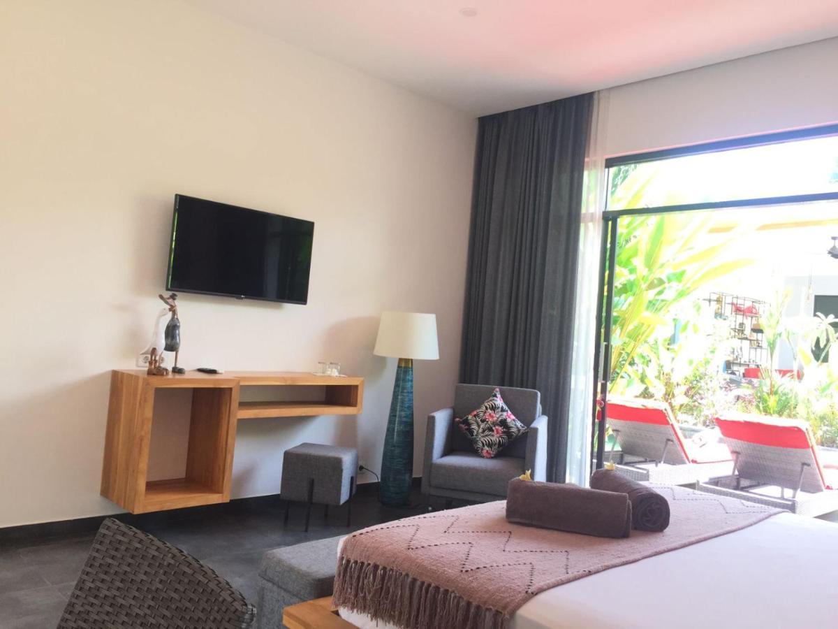 Le Chien Rouge Hotel Lovina  Ngoại thất bức ảnh